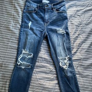 High waisted distressed jeans